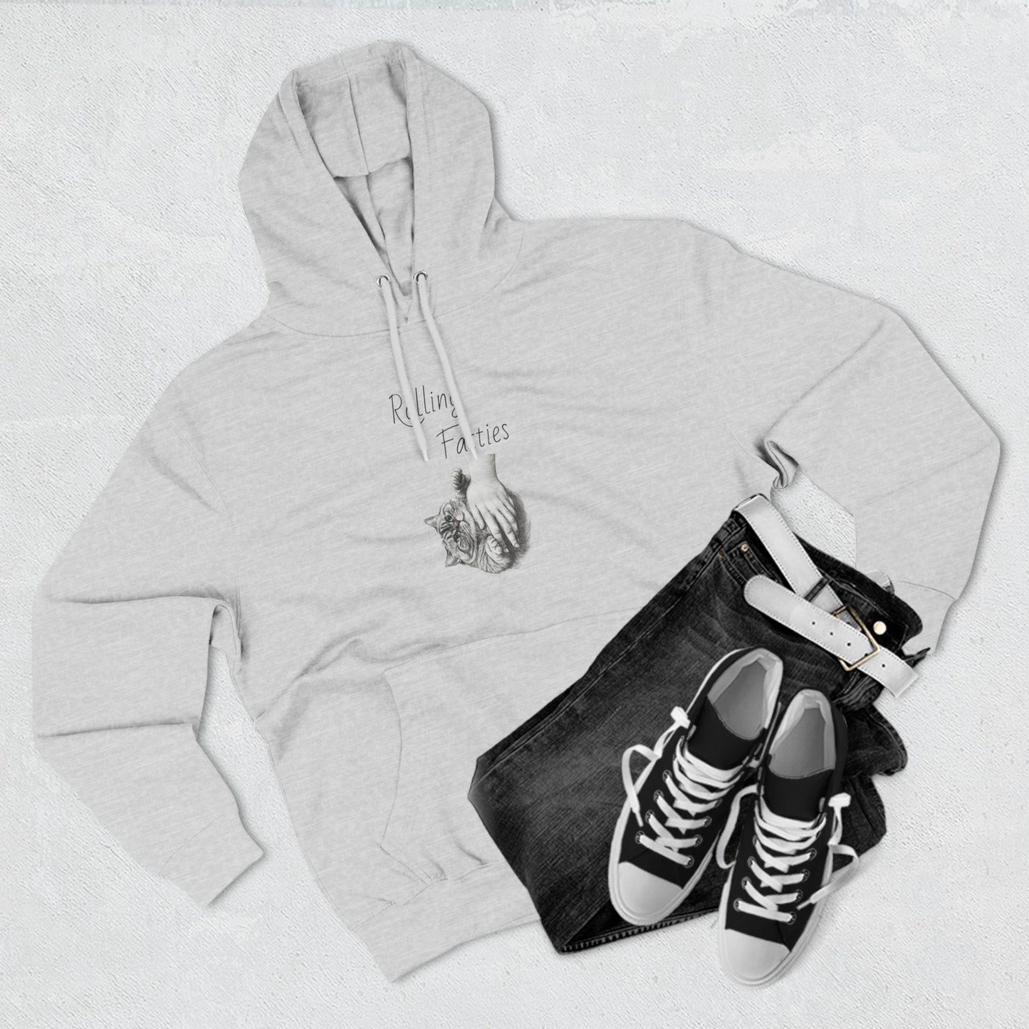 Heather gray Rolling Fatties Hoodie paired with black jeans and sneakers. A fashionable and cozy outfit for everyday wear.